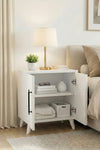 Close-up of the matt white finish and door edge on the Lumen bedside table