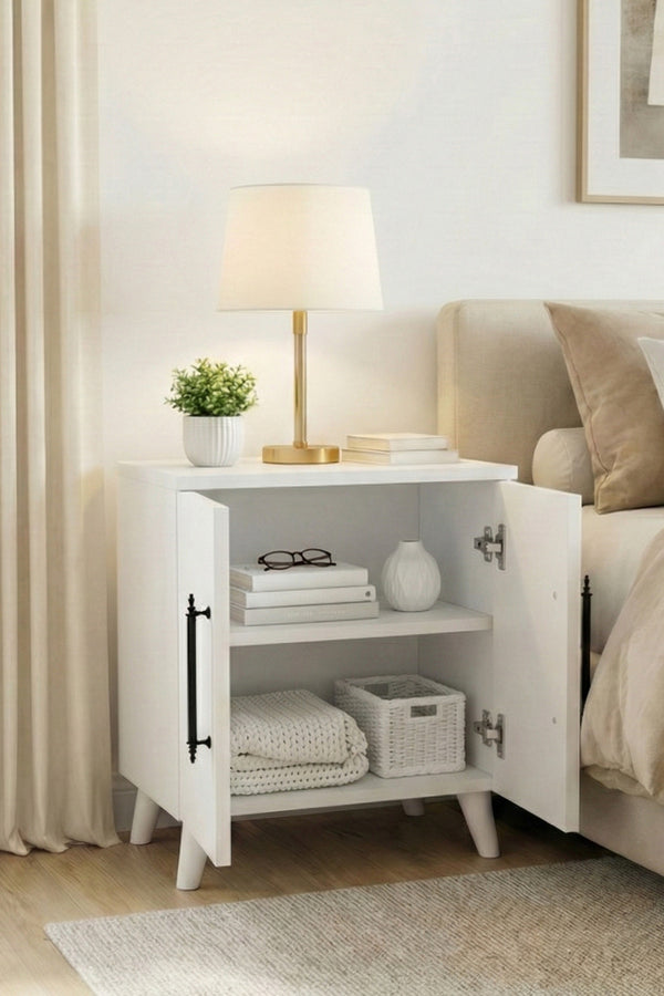 Close-up of the matt white finish and door edge on the Lumen bedside table