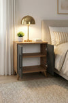 Anthracite and pine Lumen bedside table styled with a lamp and books