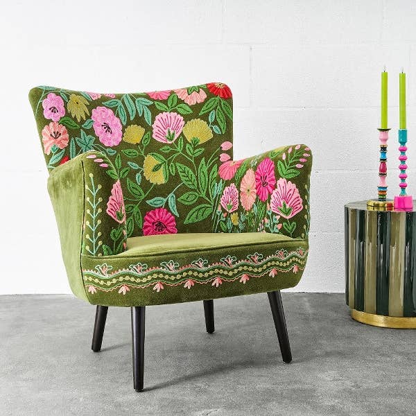 Olive green embroidered velvet armchair shown from an alternative angle - Sohowells