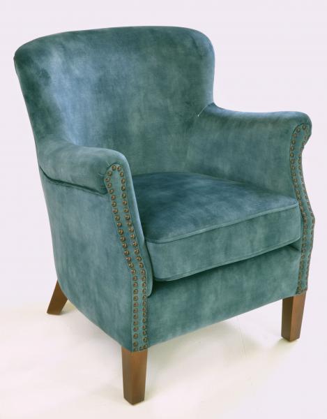 Mottled teal velvet studded armchair in a room setting - Sohowells