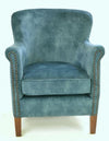Teal velvet armchair detail showing rolled arm and contrast studding - Sohowells