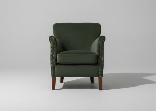 Forest green velvet occasional armchair shown from an alternative angle - Sohowells