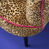 Animal print velvet armchair showing tall square back and black legs - Sohowells