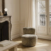 Leopard print faux fur accent chair shown in a room setting - Sohowells