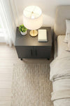 Side profile showing the 32cm depth of the anthracite Lumen bedside cabinet