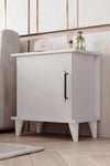 Adela white bedside cabinet styled with books and accessories on the open shelves - Sohowells