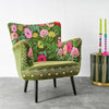 Olive green embroidered velvet armchair shown from an alternative angle - Sohowells
