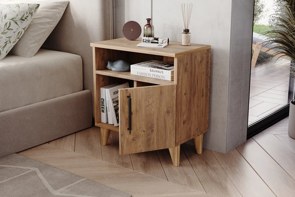 Angled view of Kommen light pine bedside cabinet showing raised legs - Sohowells
