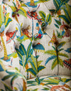 Side profile of monkey parasol print button back occasional chair