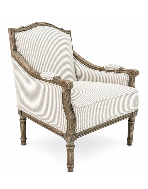 Side profile of tall high back blue and white striped armchair showing mango wood legs