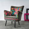 Charcoal grey embroidered velvet armchair shown from an alternative angle - Sohowells
