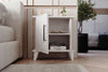 Angled view of Adela matt white bedside cabinet showing shelving - Sohowells