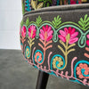 Hand embroidered charcoal armchair in a room setting - Sohowells
