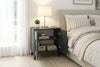 Lumen anthracite bedside cabinet shown in a bedroom setting - Sohowells