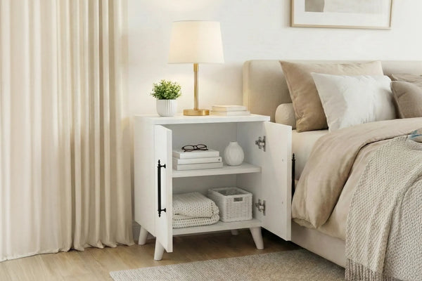 Lumen matt white bedside cabinet shown in a bedroom setting - Sohowells