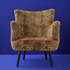 Leopard print velvet armchair shown from an alternative angle - Sohowells