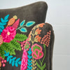 Close up of hand embroidered floral detail on charcoal velvet armchair - Sohowells